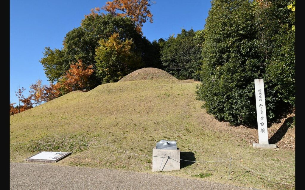 The grass-covered mound of Kitora Tomb, home to the oldest star chart in East Asia.